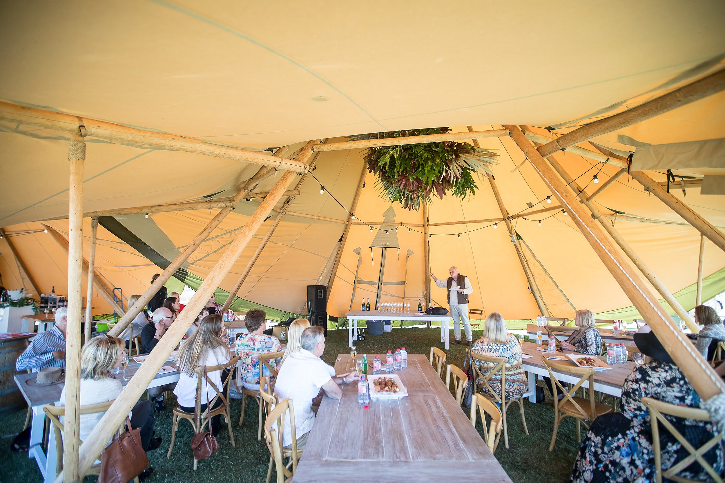 Sanctuary Cove Winter Wine Festival sip wine under the tipis